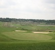 Quarry Golf Club's par-5 18th plays to an elevated green that sits just below the clubhouse. 