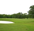 The par-3 eighth hole requires a tee shot to an elevated green protected by water left and short at The Republic. 