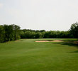 The par-4 12th hole at The Republic features a green guarded by bunkers in front. 
