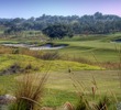 The 17th hole at Cordillera Ranch Golf Club is a long par 4 with a bunker lining the entire left side.