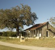 An old home built in 1872 by settlers to the area lies next to the ninth tee box at Cordillera Ranch G.C.