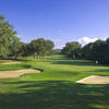 A view of green protected by bunkers at Hill Country Golf Club